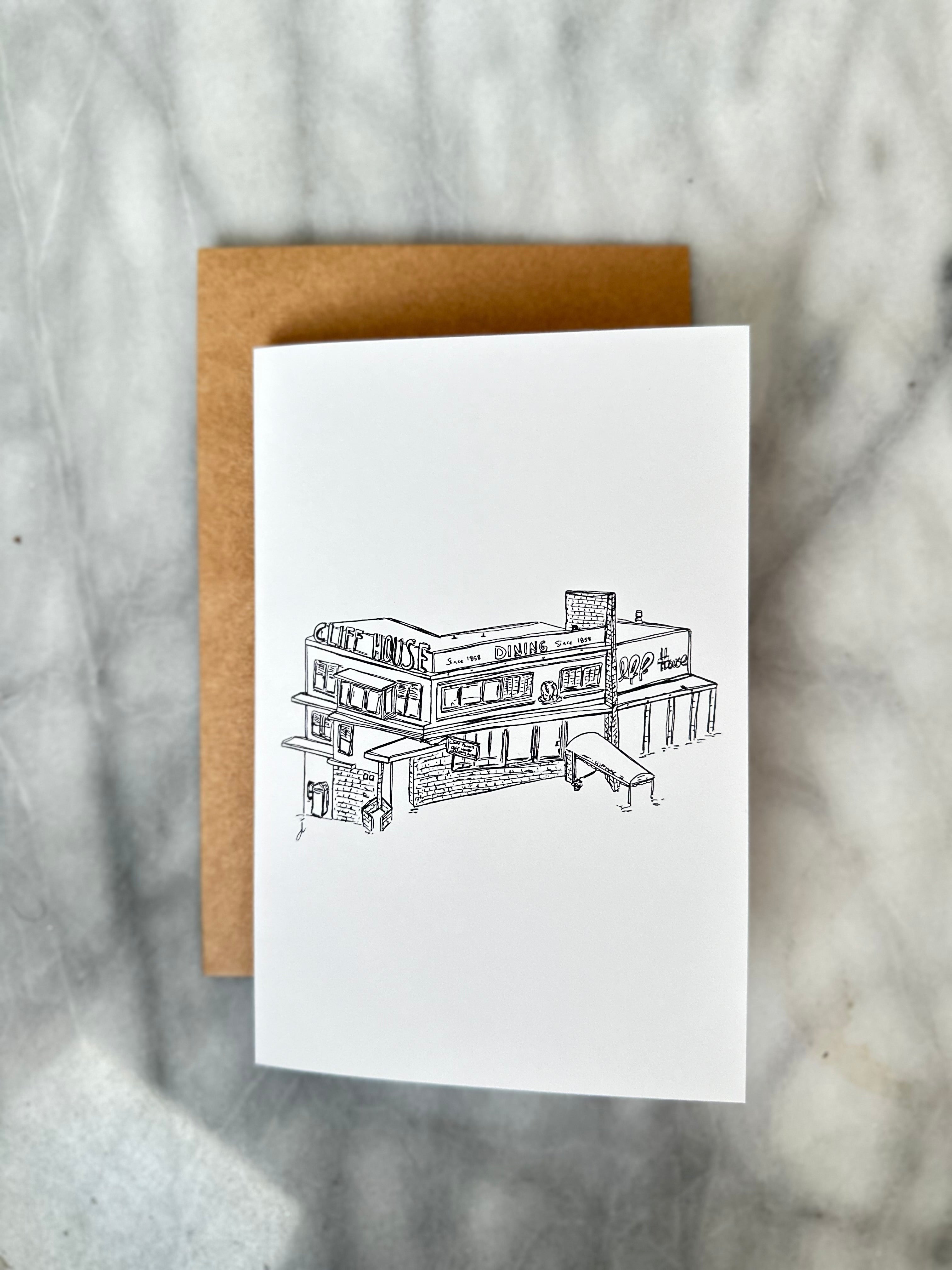 Greeting Card with black and white fine line sketch of the Cliff House against marble background