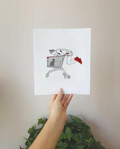 Black Cat in Shopping Cart Art Print by Leslie Molina.