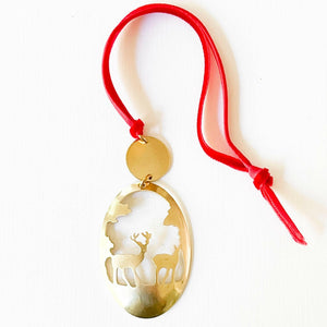 Brass Reindeer Ornament with Red Velvet Ribbon.