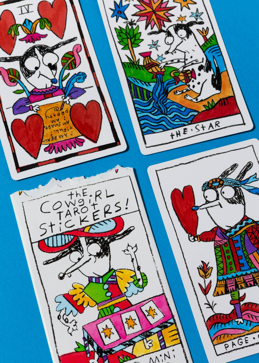 Colorful tarot card illustrations on a blue background