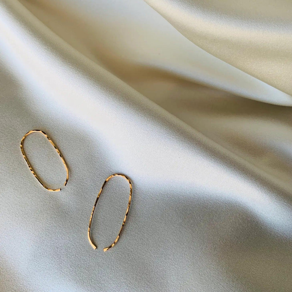 Desert Chic: Handcrafted Hammered Oval Hoop Earrings by Points Jewelry.