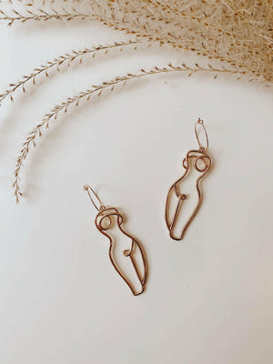 Feminine Silhouette Outline Statement Earrings.