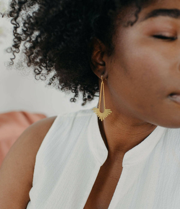 Gold Chain with Dangling Pendant Earrings.