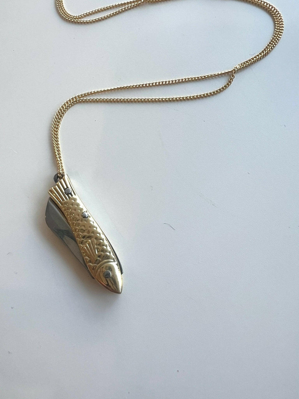 La Sardine Brass Pocket Knife Necklace by Océanne.