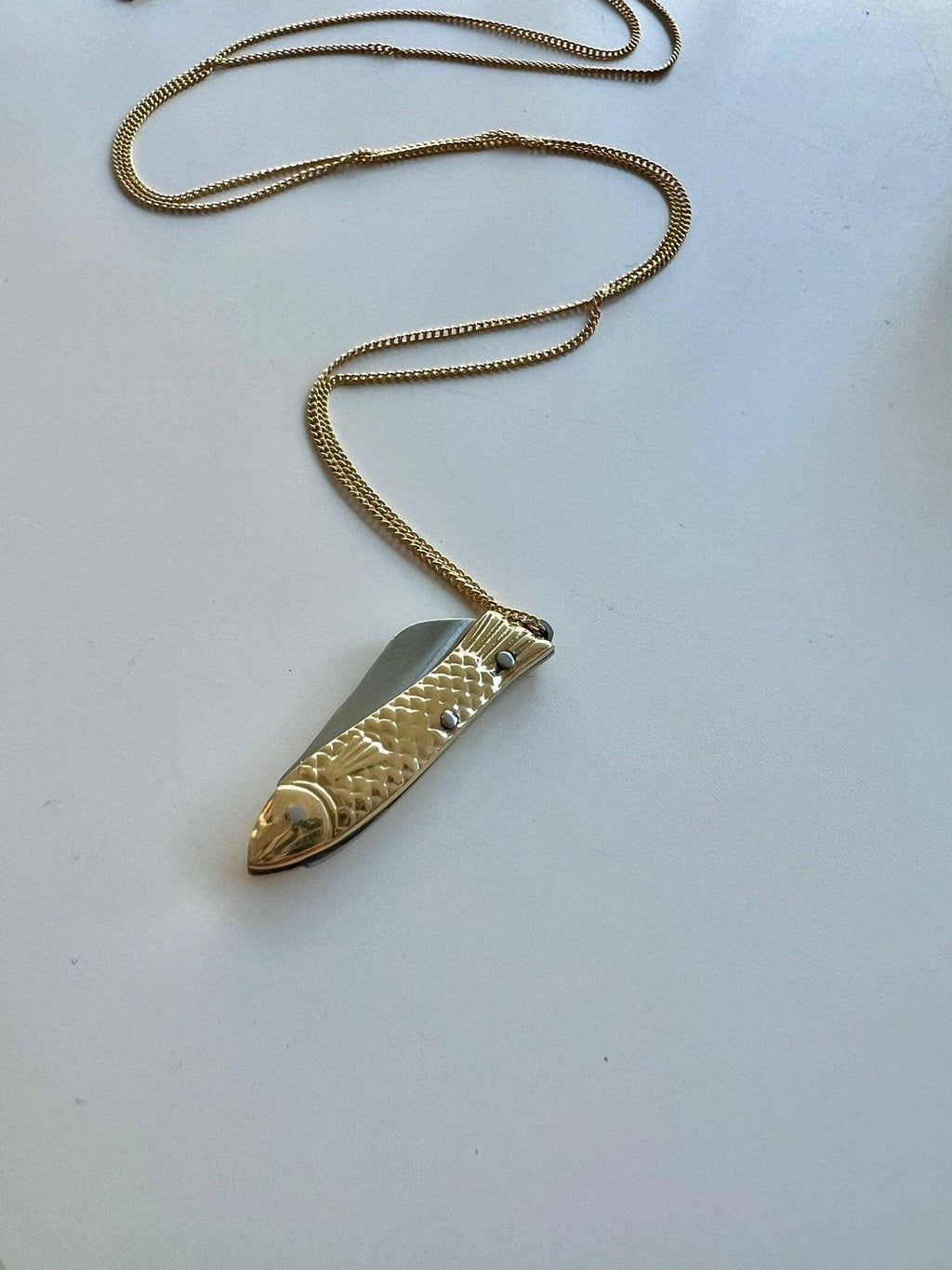 La Sardine Brass Pocket Knife Necklace by Océanne.
