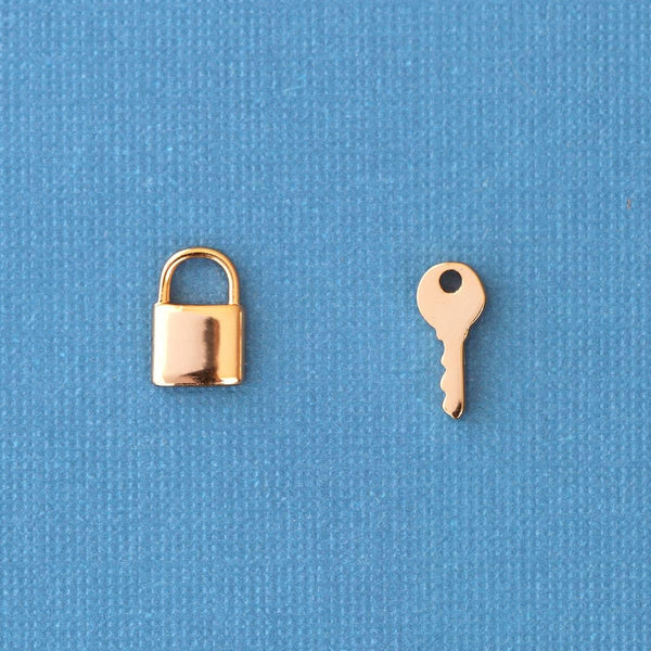 Lock & Key Mismatched Stud Earrings.