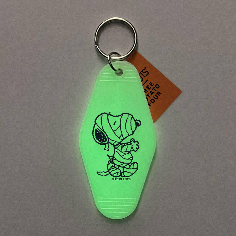 Mummy Snoopy & Ghost Charlie Brown Glow-in-the-Dark Keychain.