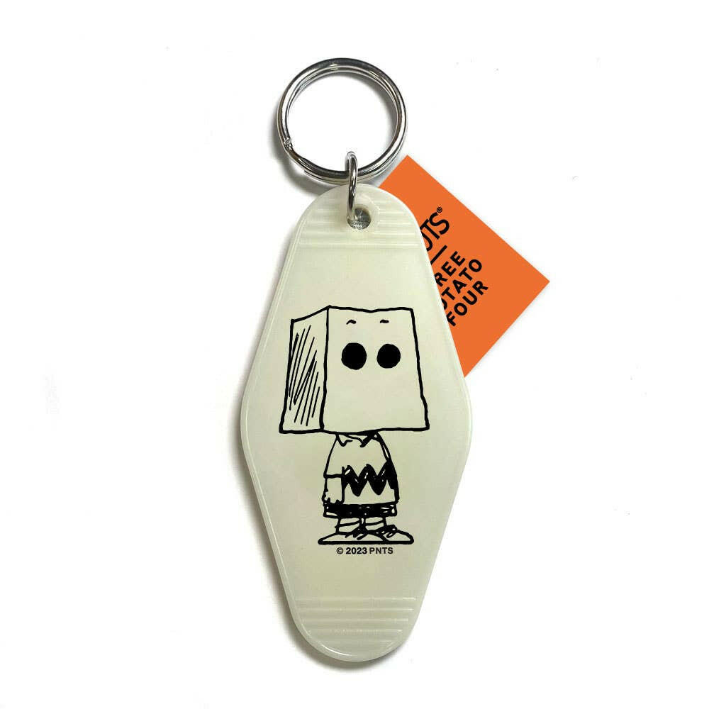 Mummy Snoopy & Ghost Charlie Brown Glow-in-the-Dark Keychain.