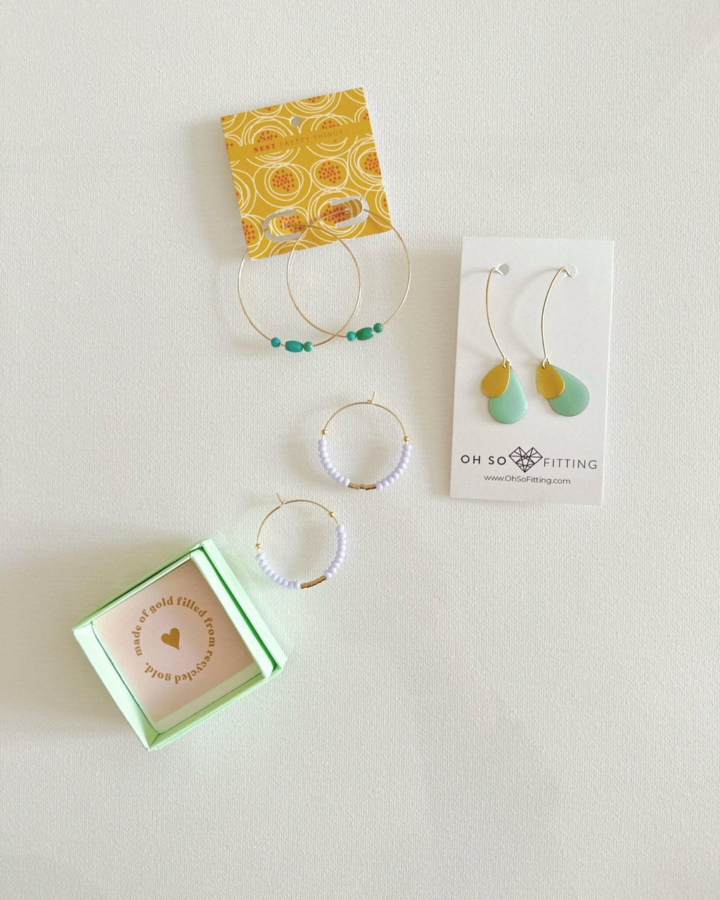 SAN SAN Summery Hoop Earrings: Vibrant Elegance with Sustainable Shine.