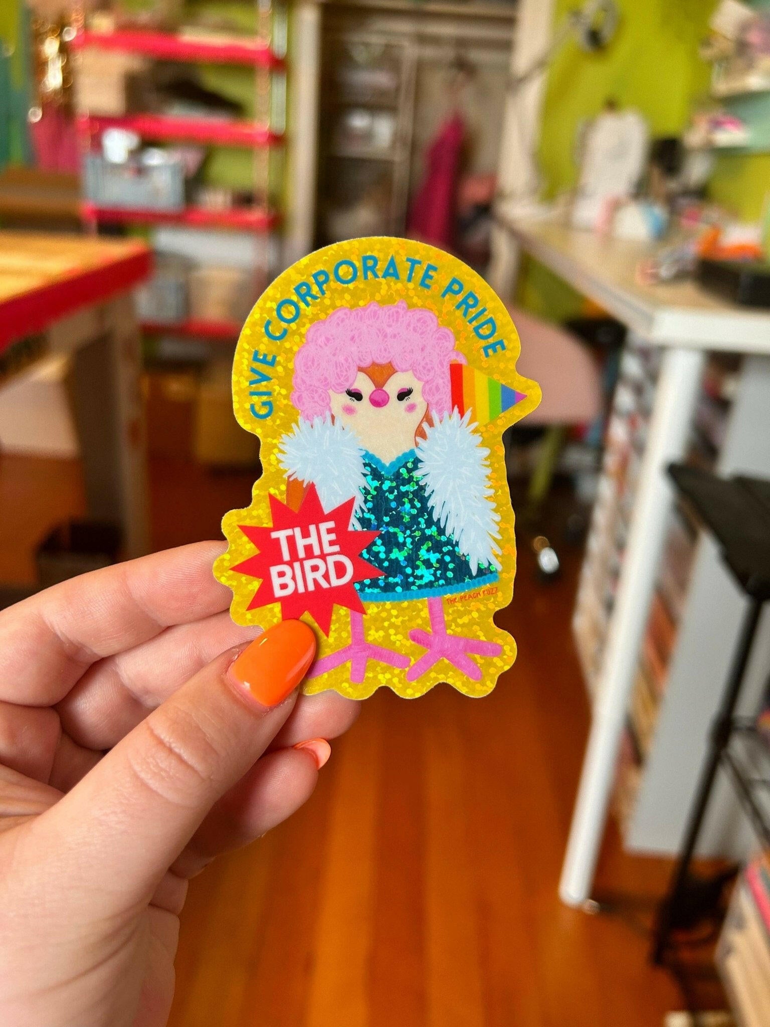 Give Corporate Pride The Bird Glitter Sticker.