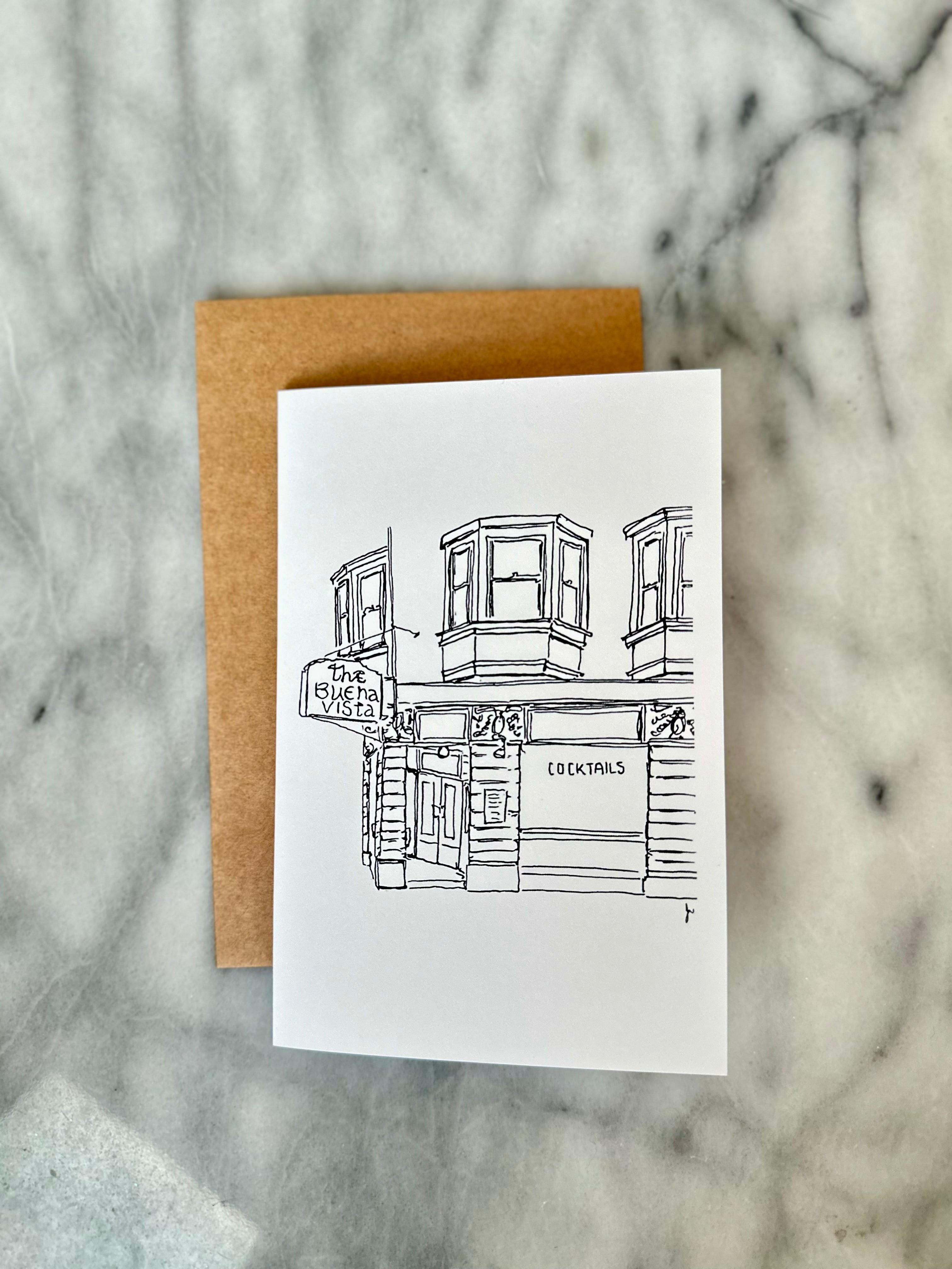 Greeting card with a black and white illustration of the buena vista cafe on a marble surface